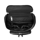 Top view of the unzipped main compartment of a black leather nappy backpack with silver hardware on a white background from Tottie.