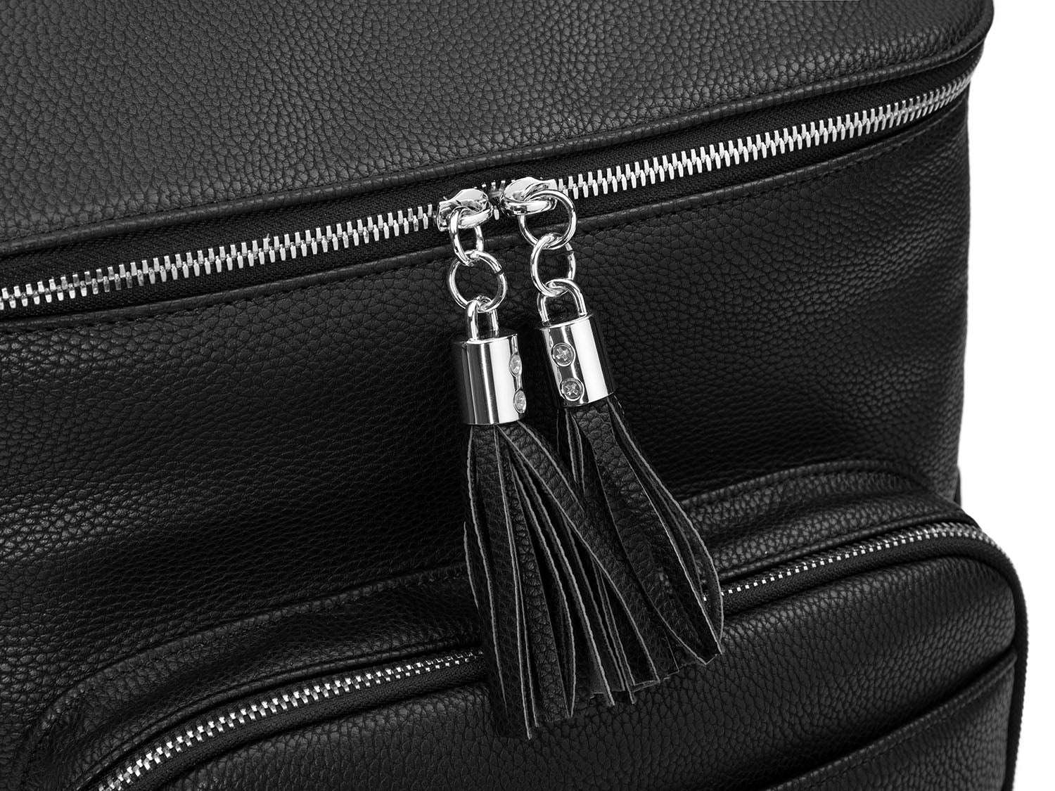 A black leather baby backpack with silver zippers on white background